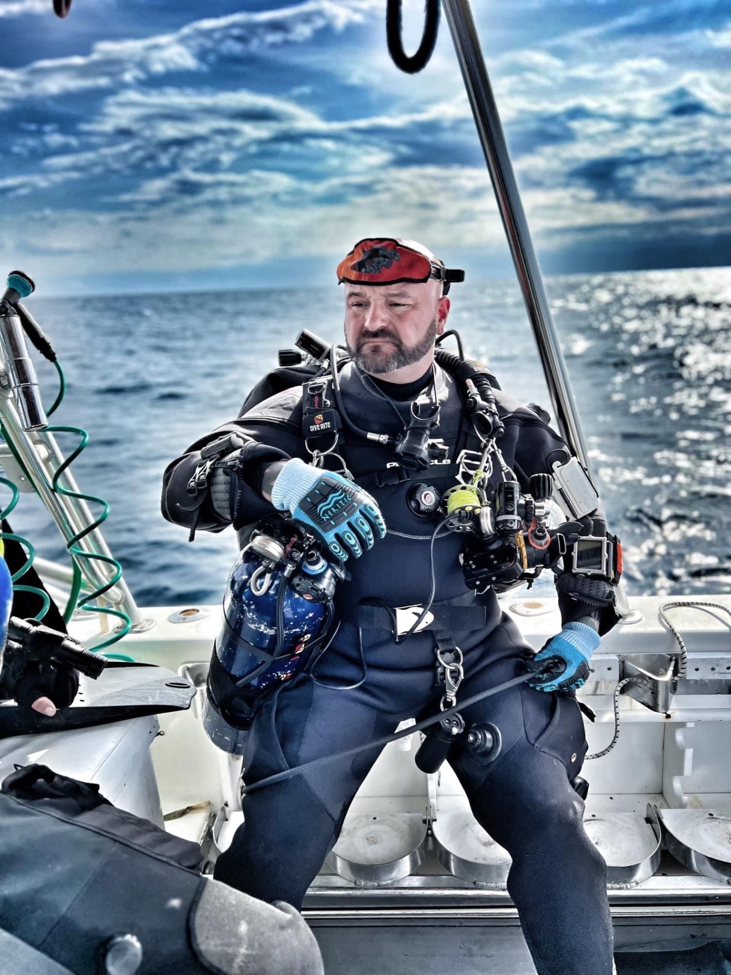 Nick Jones geared up in technical diving equipment